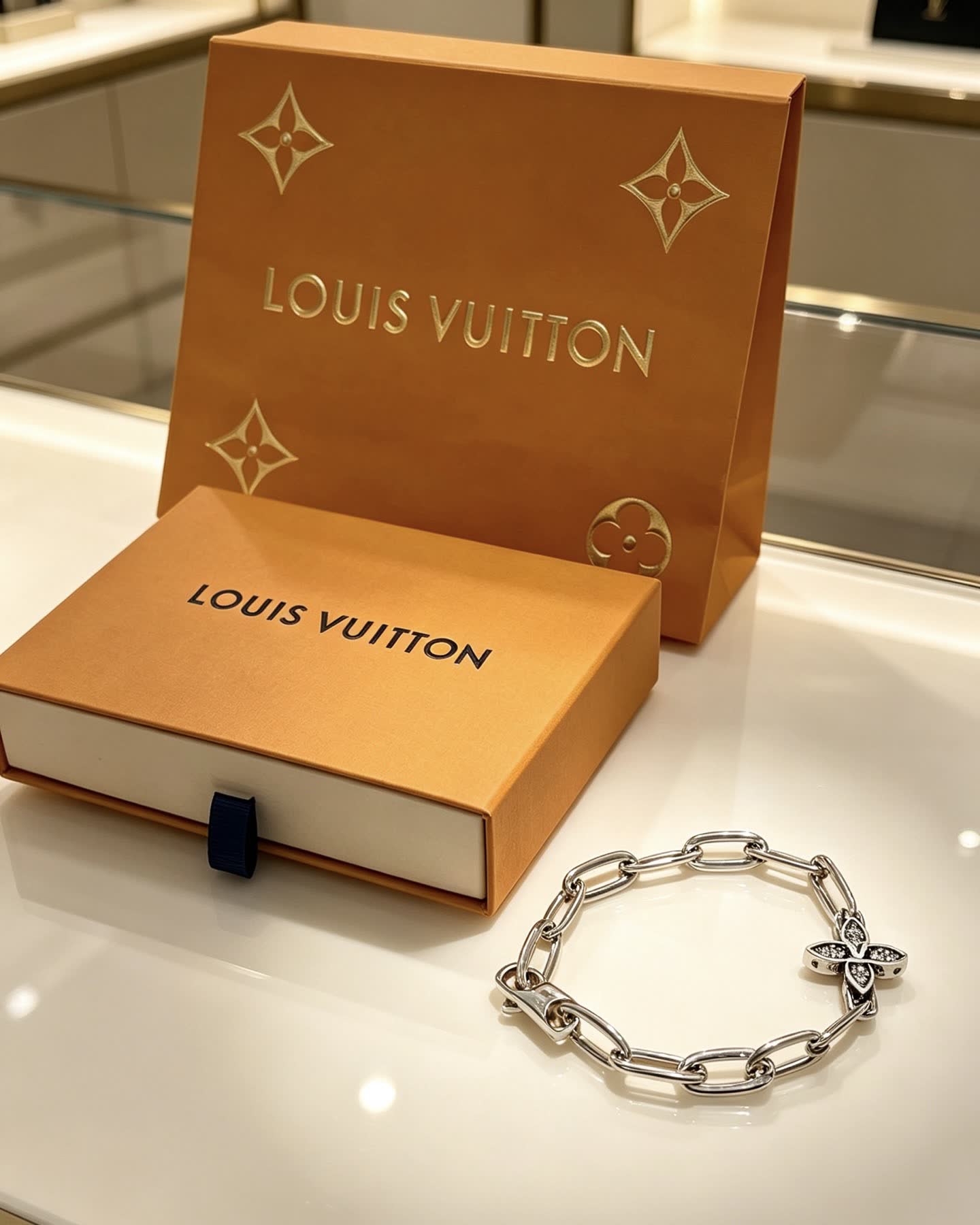 Louis Vuitton Silver Bracelet with Monogram Flower Charm